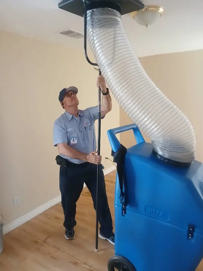 HVAC Installation technician using HEPA equipment in Winslow